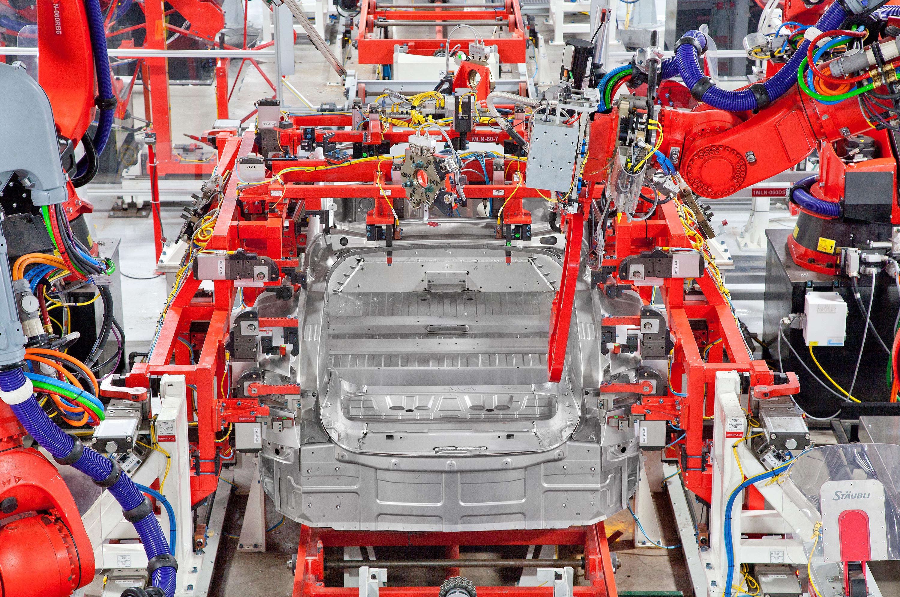 Inside Tesla's car body factory on June 5, 2012. Photographer: Tesla Motors Events