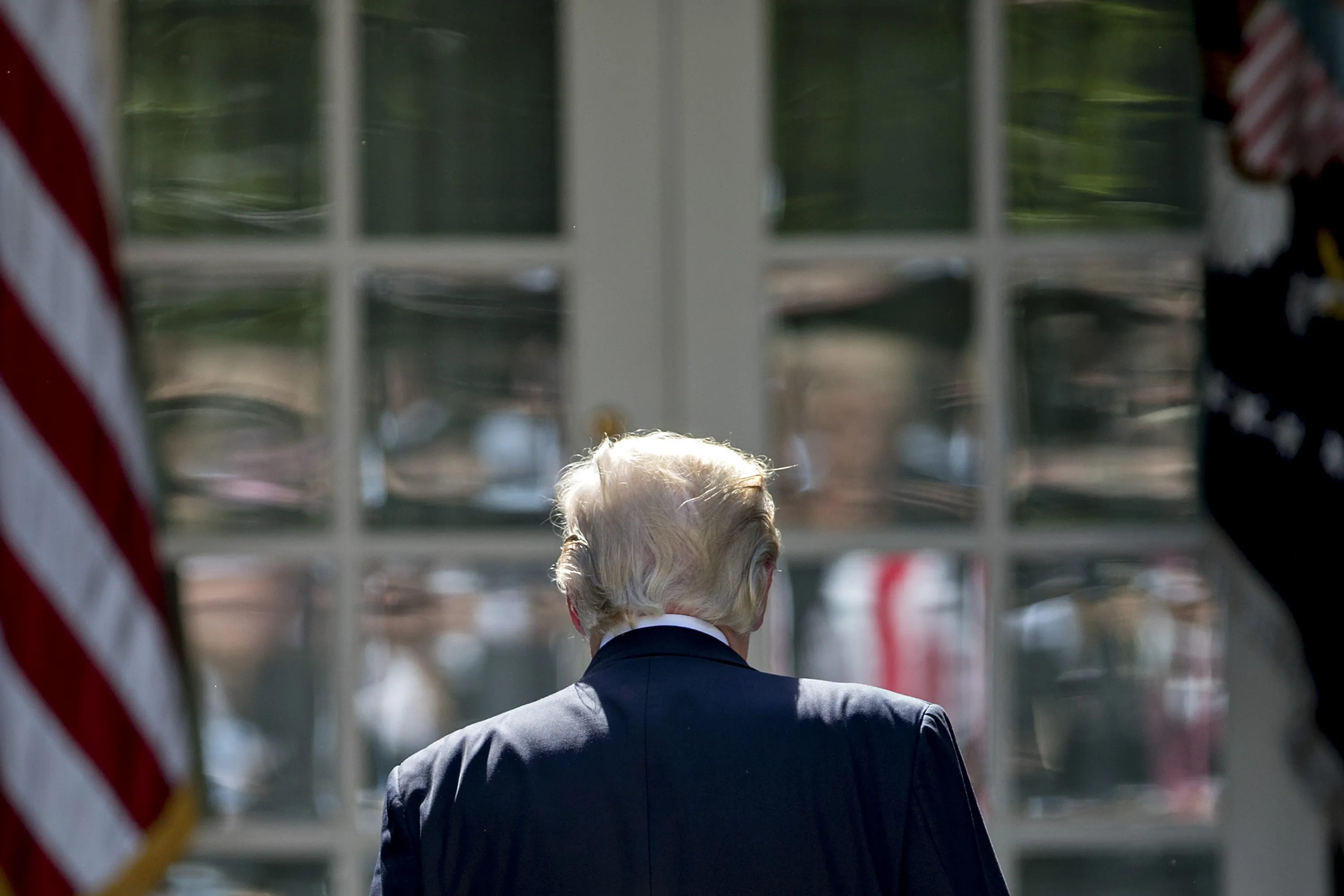 President Donald Trump walks away after announcing the US withdraw from the Paris climate pact in a speech from the Rose Garden of the White House in&nbsp;2017.