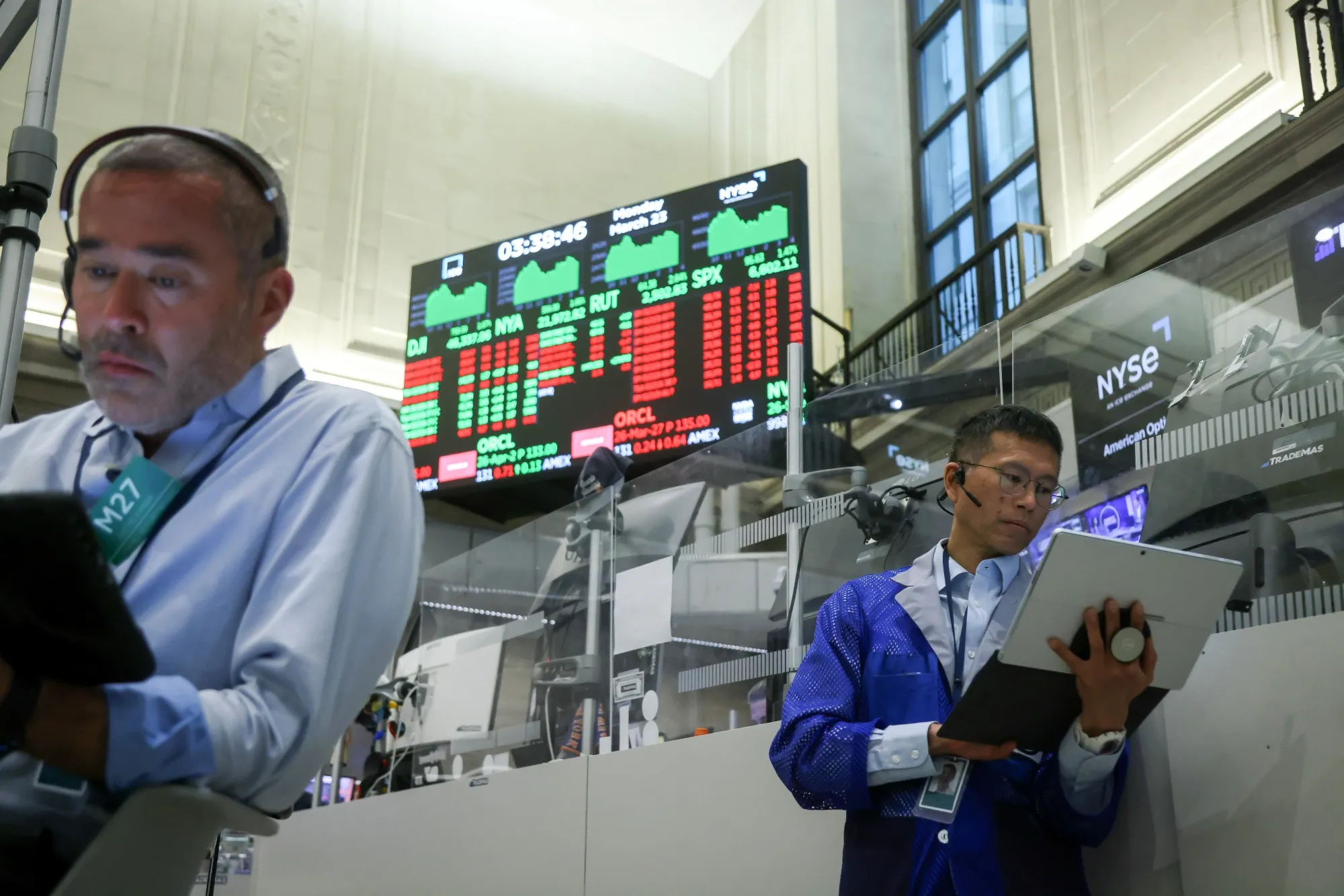 Traders work on the floor of the&nbsp;New York Stock Exchange.
