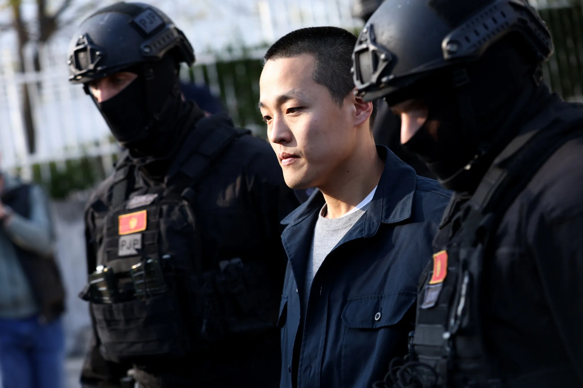 Police officers escort Do Kwon&nbsp;in Podgorica, Montenegro, on March 23, 2024.&nbsp;