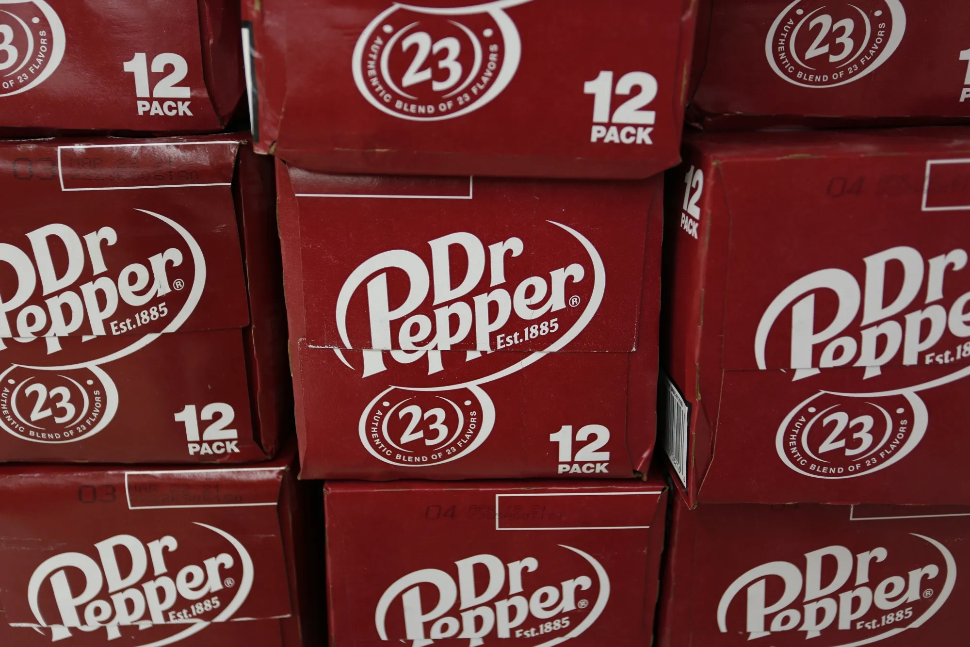 Cases of Keurig Dr Pepper Inc. soft drinks are displayed for sale at a grocery store in Louisville, Kentucky.