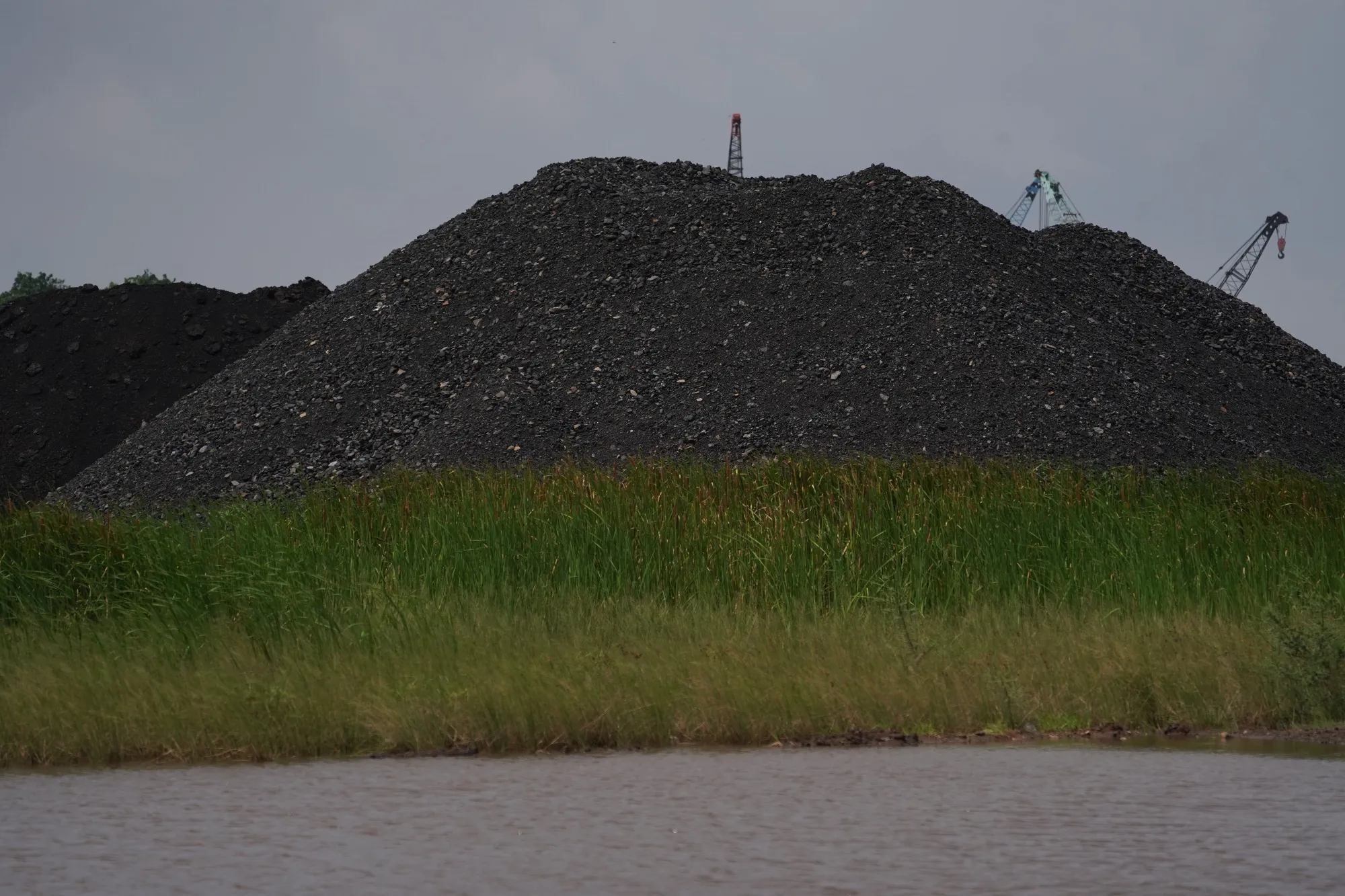 Coal Stockpiles at KCN Marunda Port As Export Ban Remains 