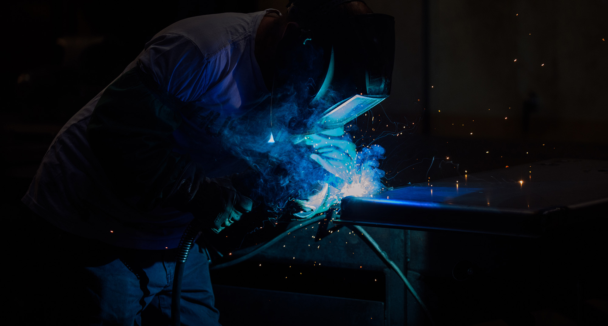 A worker welds parts for a ballot drop box inside a manufacturing facility in Puyallup, Washington.