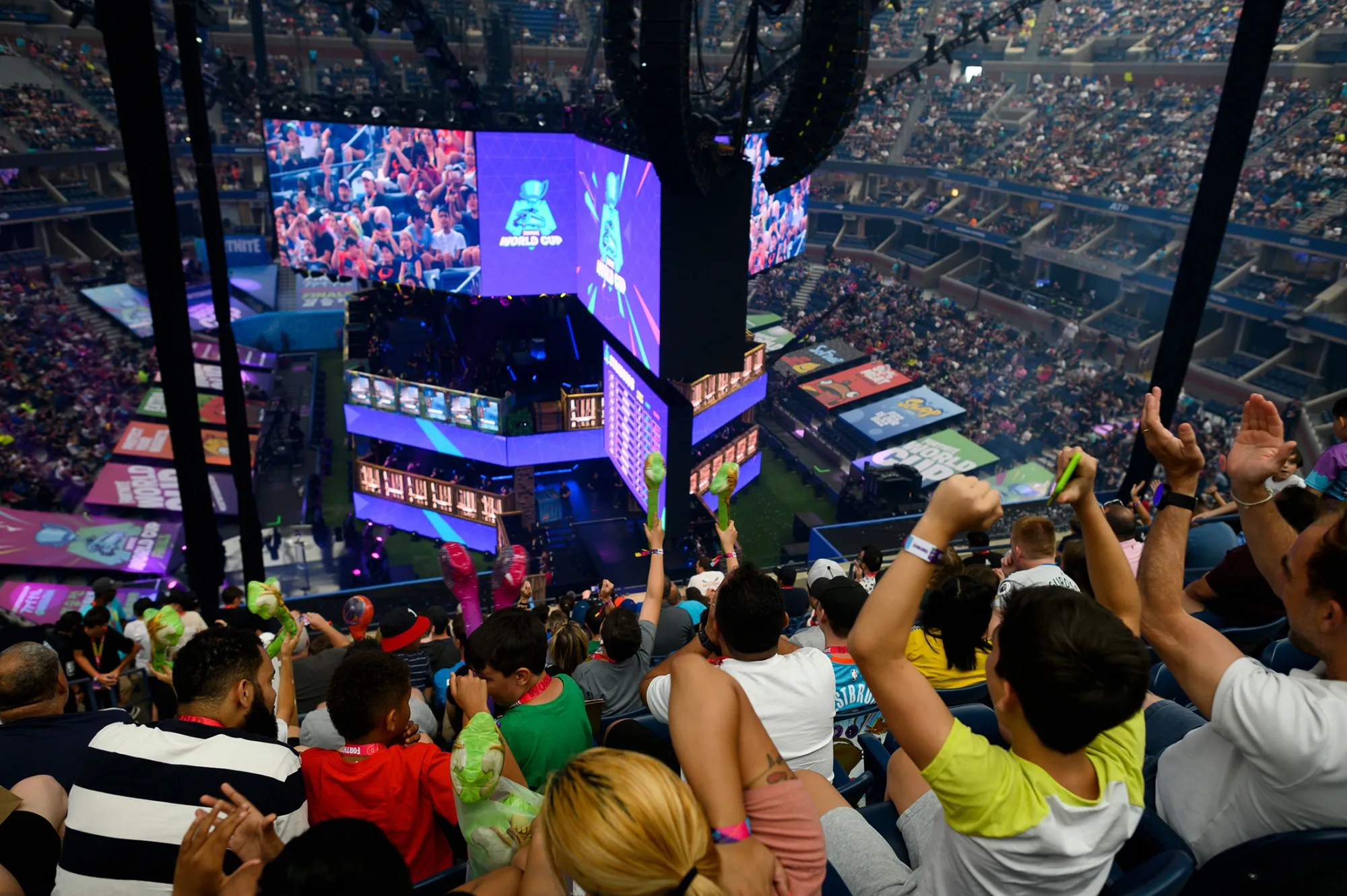 Fans cheer during the final of the solo competition at the 2019 Fortnite World Cup in New York.