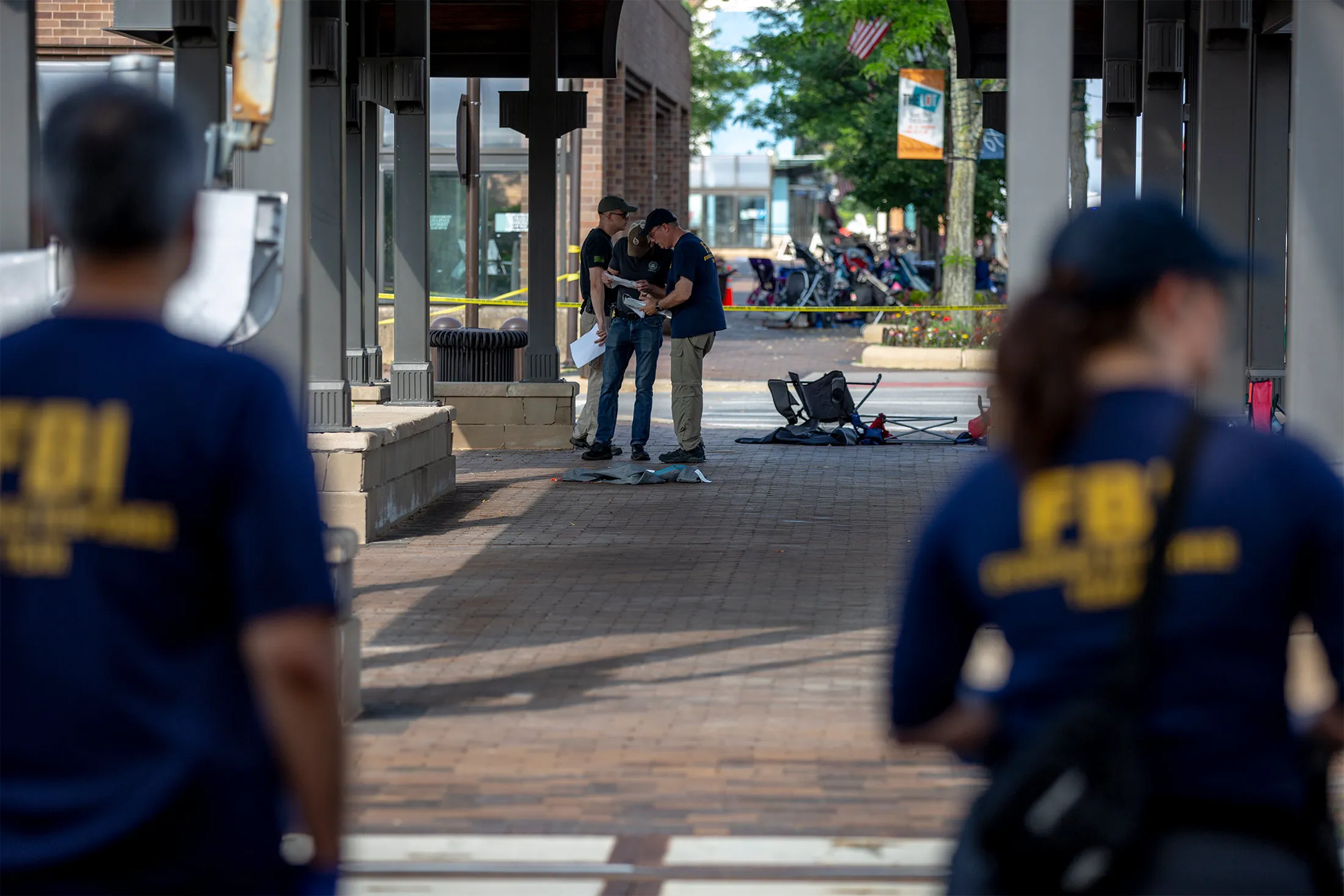 FBI agents work the scene of the shooting at a Fourth of July parade in Highland Park, Illinois on&nbsp;July 5.