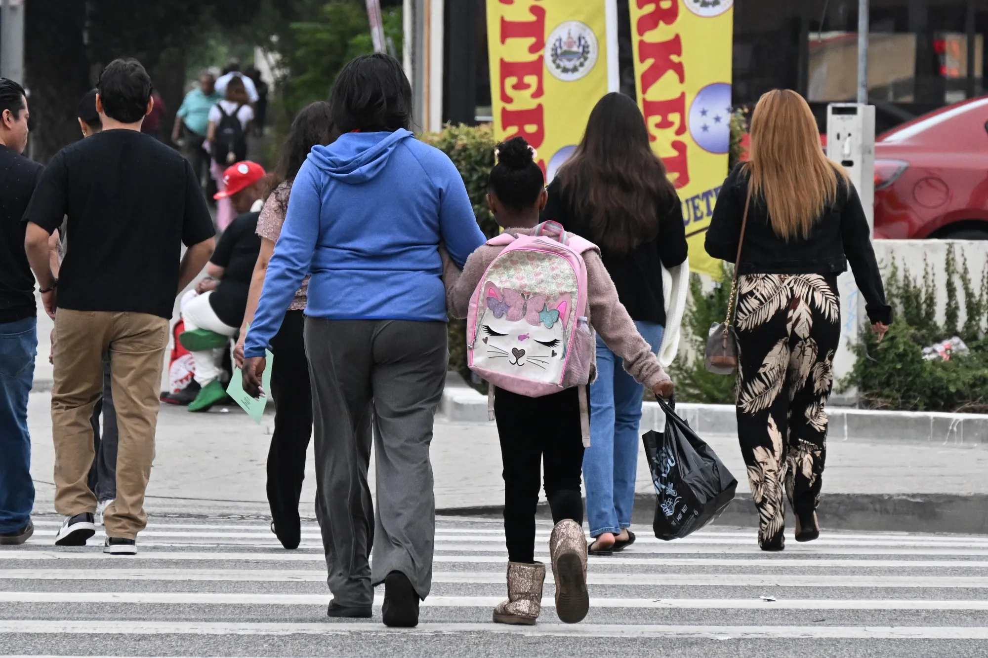 A student heads to&nbsp;school in Los Angeles.&nbsp;