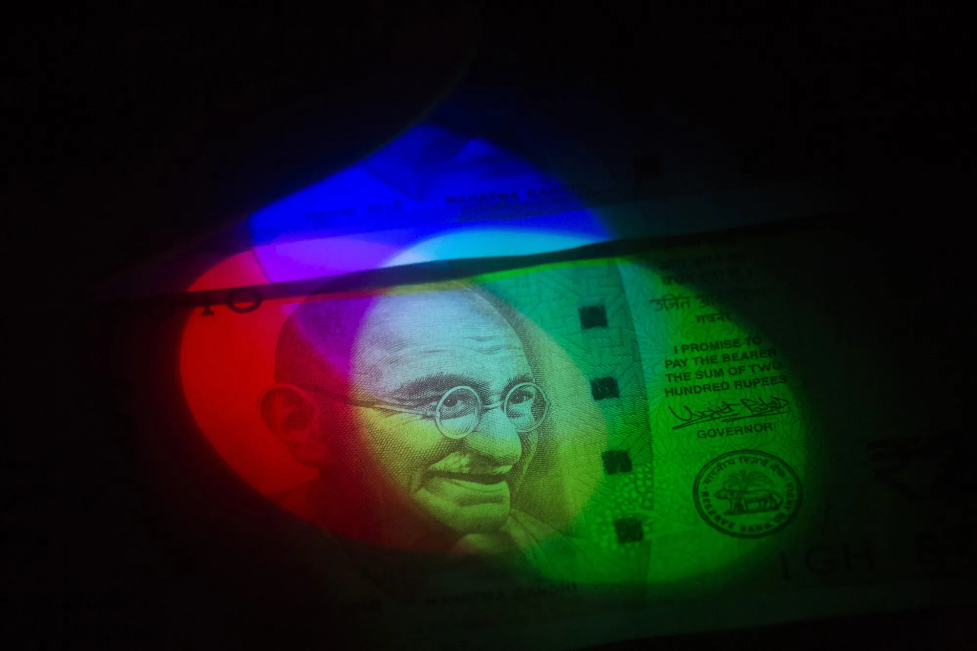 The portrait of Mahatma Gandhi is displayed on an Indian 2,000 rupee banknote.