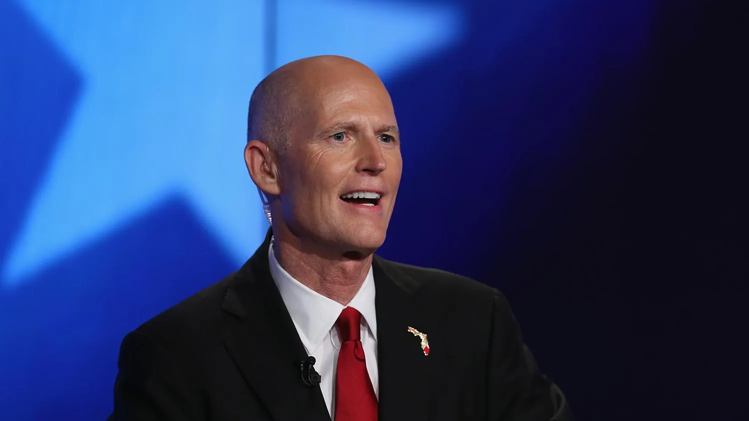 Republican Florida Governor Rick Scott speaks during a debate with former Florida Governor and Democratic candidate Charlie Crist during a televised debate at NBCUniversal/Telemundo 51 on October 10, 2014 in Miramar, Florida.
