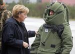 German Chancellor Angela Merkel speaks with soldiers during a visit to the German army at the barracks in Letzlingen, Germany, Tuesday, November 14, 2006.