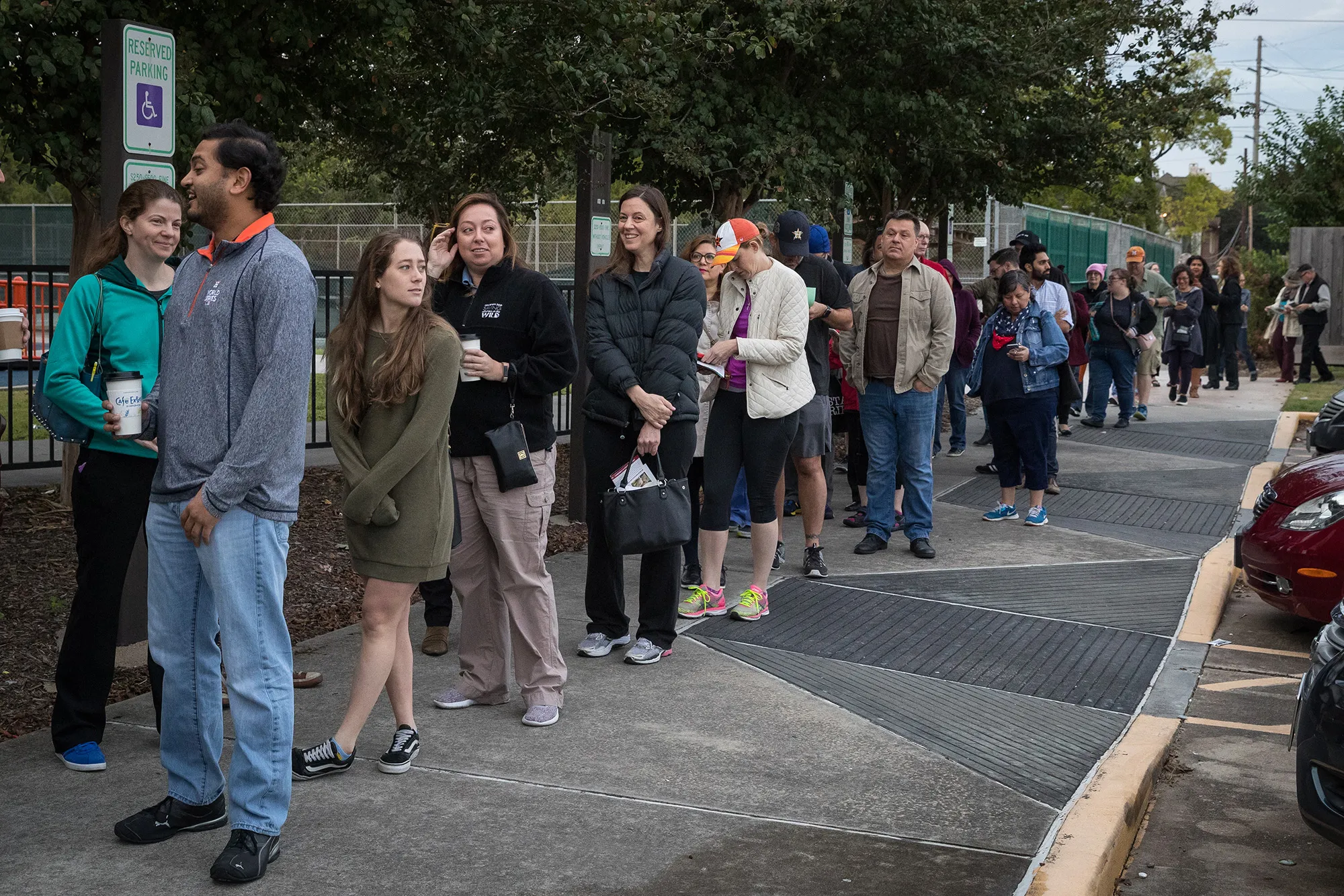 People wait in line to vote at a polling place on the first day of early voting on Oct. 22, 2018 in Houston, Texas.