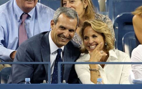 Katie Couric and husband John Molner attend Day 10 of the 2014 US Open at USTA Billie Jean King National Tennis Center in courtside seats.