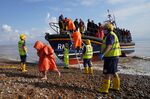 Migrants brought in to Dungeness, Kent, onboard an RNLI Lifeboat, Aug. 27.