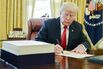 President Trump Signs The Tax Cuts And Jobs Act Into Law 