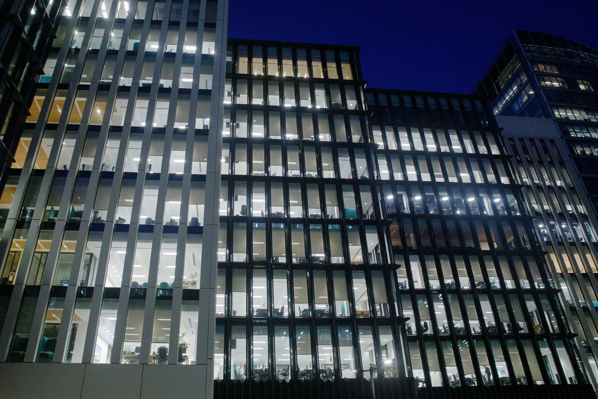 Illuminated floors of an office building in the City of London on March 16.