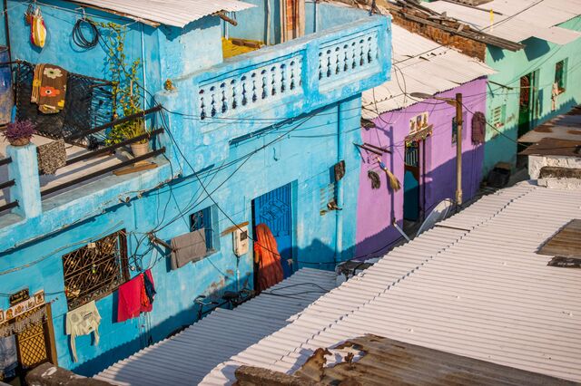 An aerial view of installed cool roof on terrace at Saraspur village chawl in Ahemdabad, Gujarat, India, on Friday, May 6, 2023. Photographer: Prashanth Vishwanathan /Bloomberg