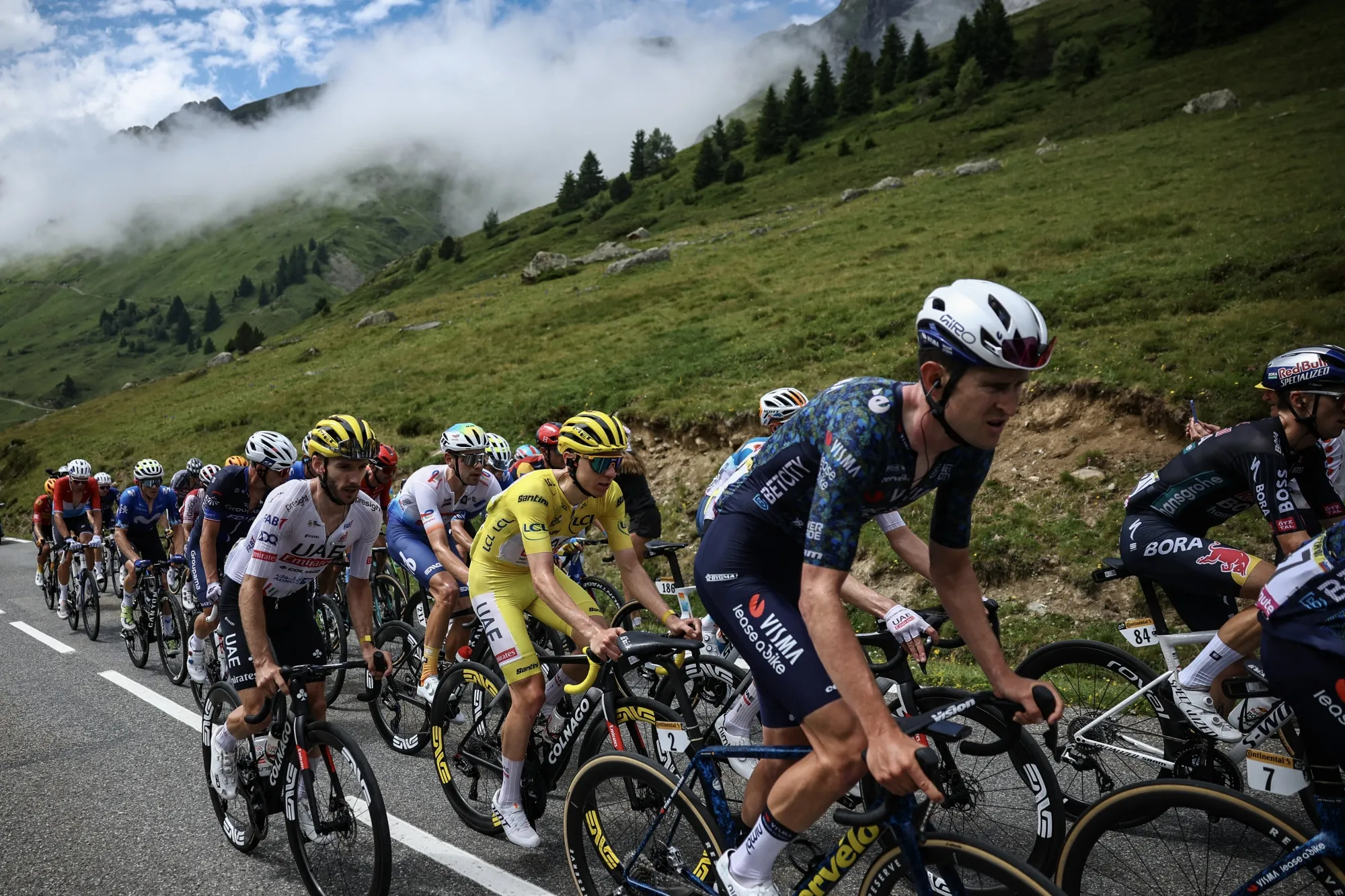 Cyclers on the ascent of Col du Tourmalet during the 14th stage of the 2024 Tour de France cycling race in the Pyrenees mountains in France&nbsp;on July 13.