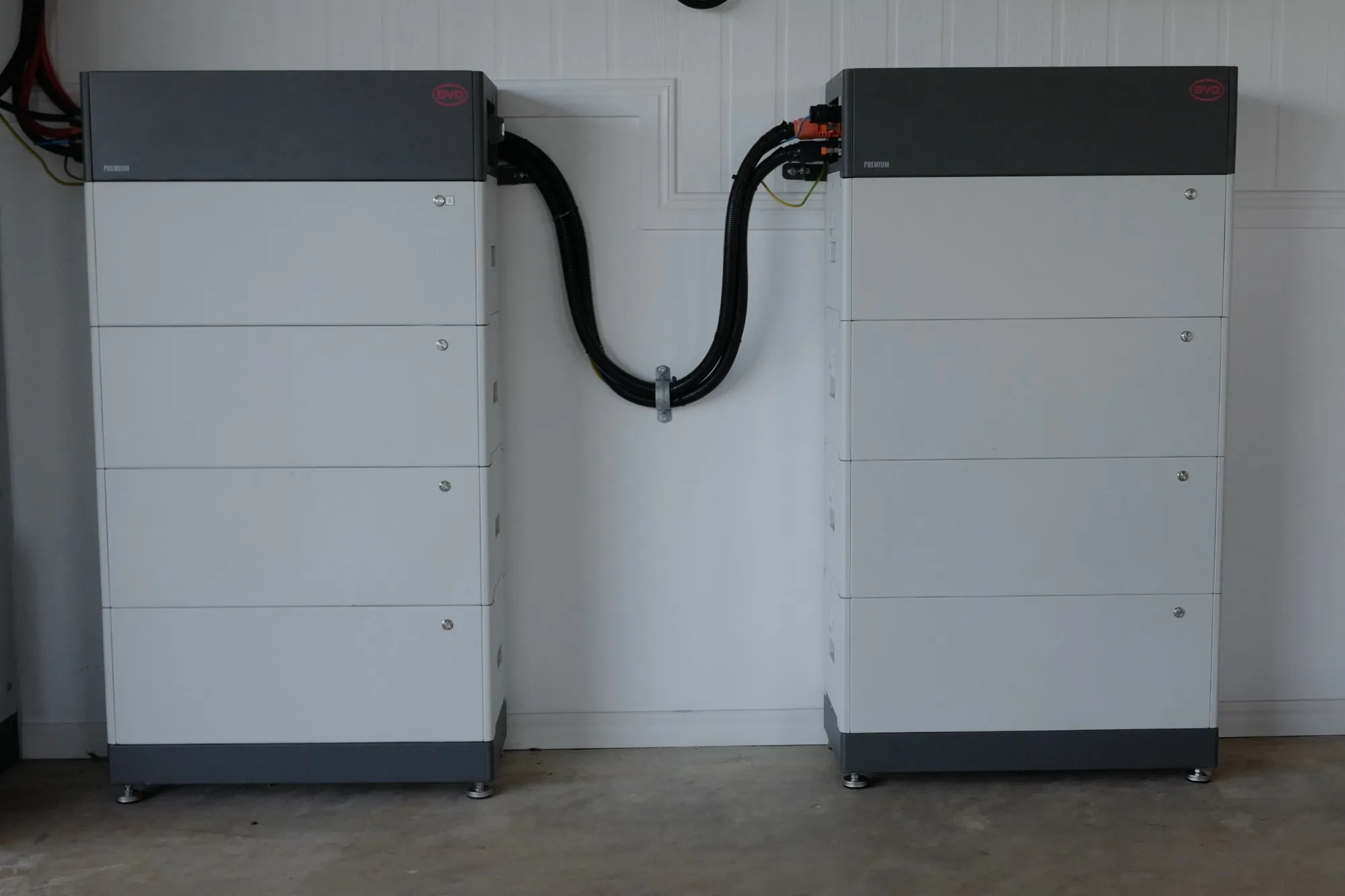 A collection of BYD batteries inside a garage of a home&nbsp;in Byron Bay, Australia.