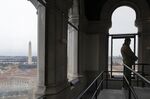 The Washington Monument is seen as a National Park Service park ranger stands in the Old Post Office Pavilion Museum, housed in the Trump International Hotel, during the partial government shutdown in Washington, D.C.&nbsp;on&nbsp;Jan. 12, 2019.