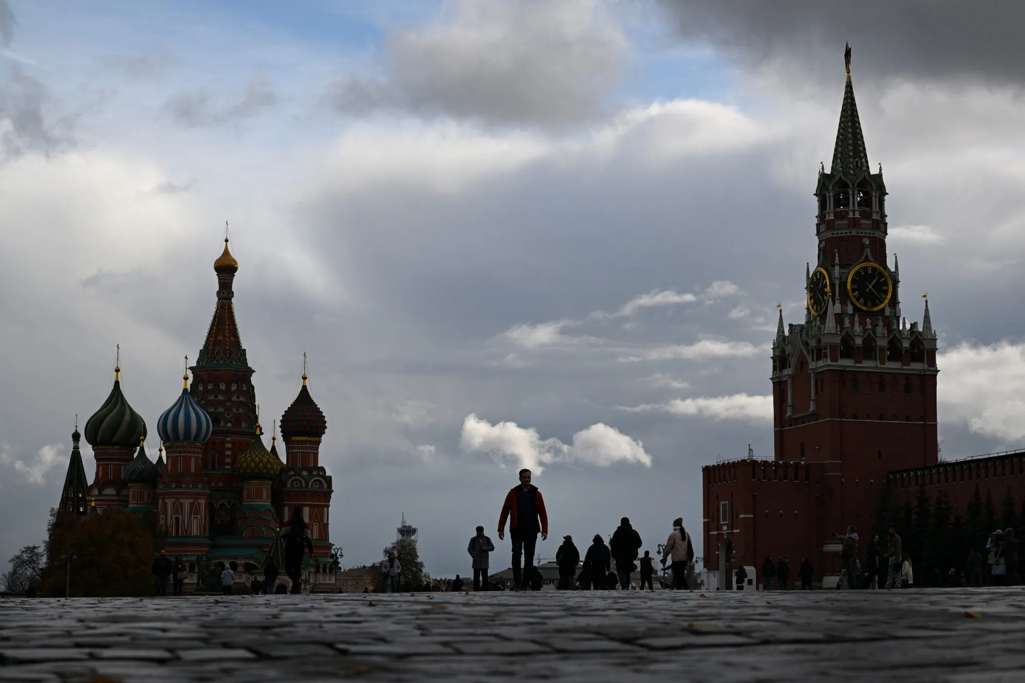 People walk through Red Square in Moscow.