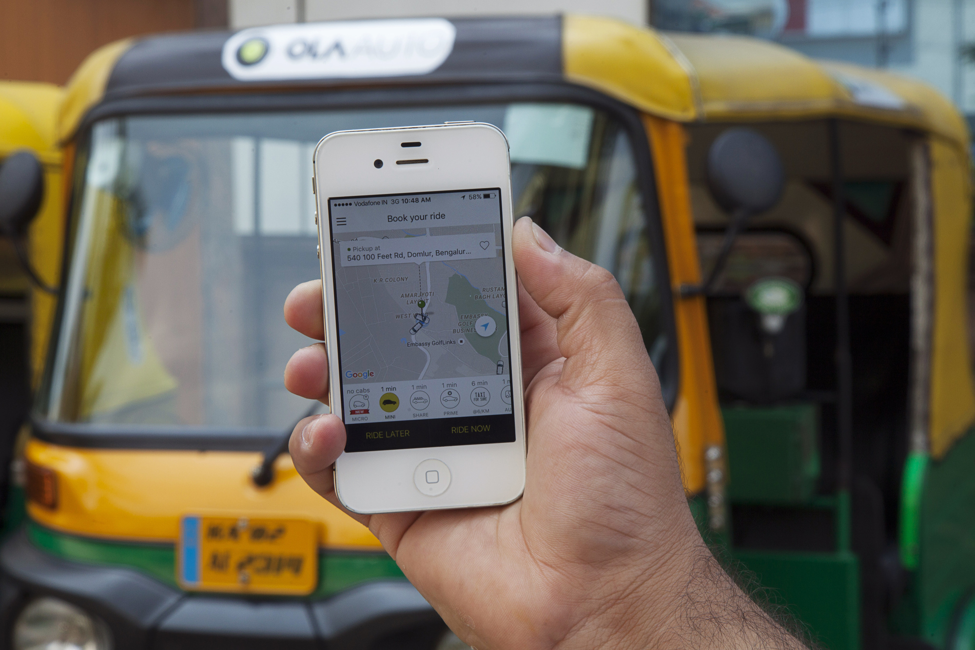 The app of ride-hailing service Ola, owned by ANI Technologies Pvt., is displayed in Bengaluru, India.