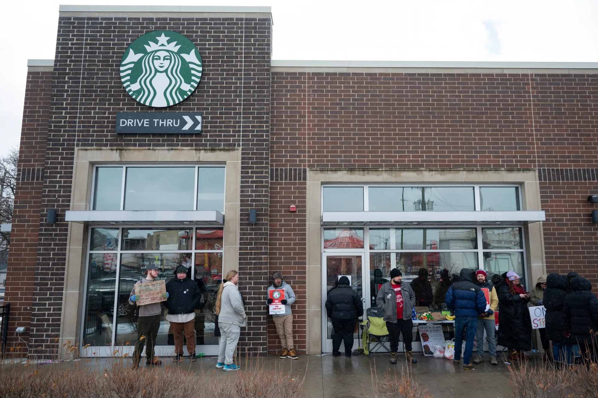 Starbucks Workers United members picket outside a location in Chicago in December.&nbsp;