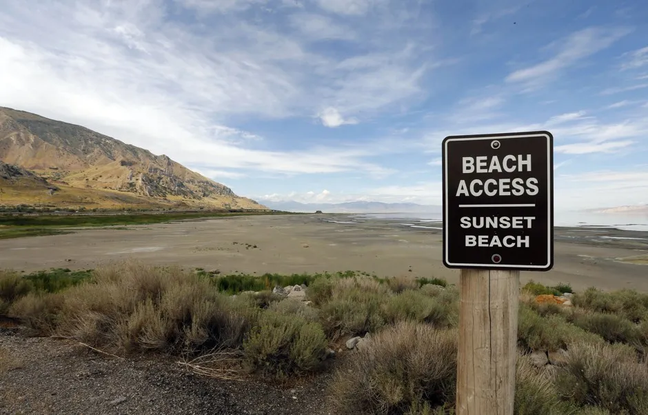 Mud flats sit where water used to be next to the Great Salt Lake Marina west of Salt Lake City, Utah.