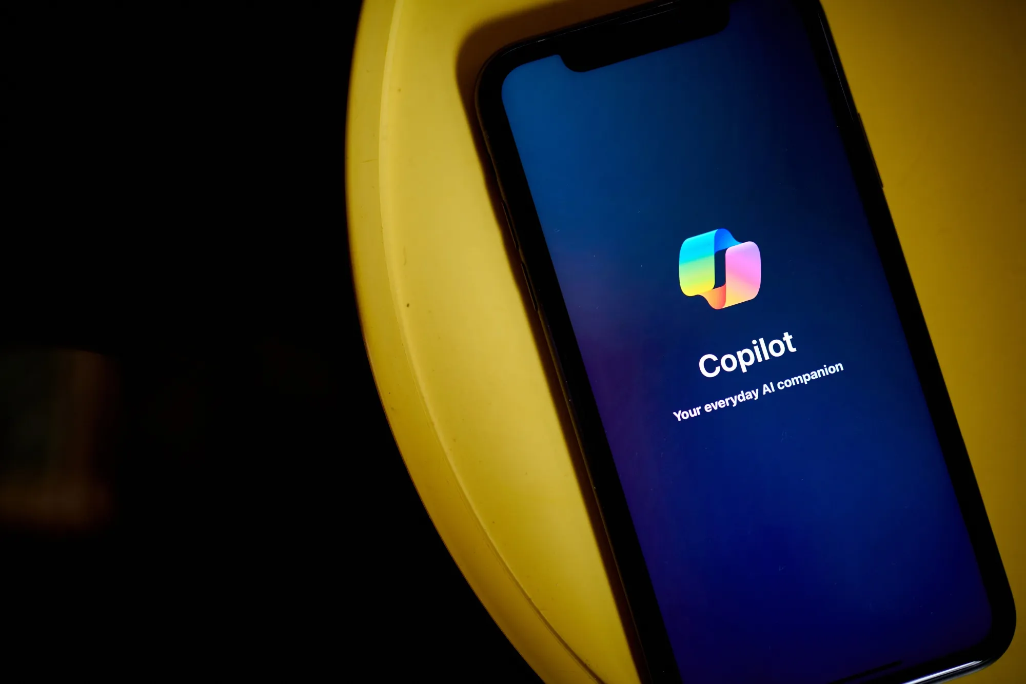 The Copilot logo on a smartphone.
