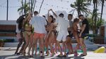 Love Island contestants enjoy a pool party.