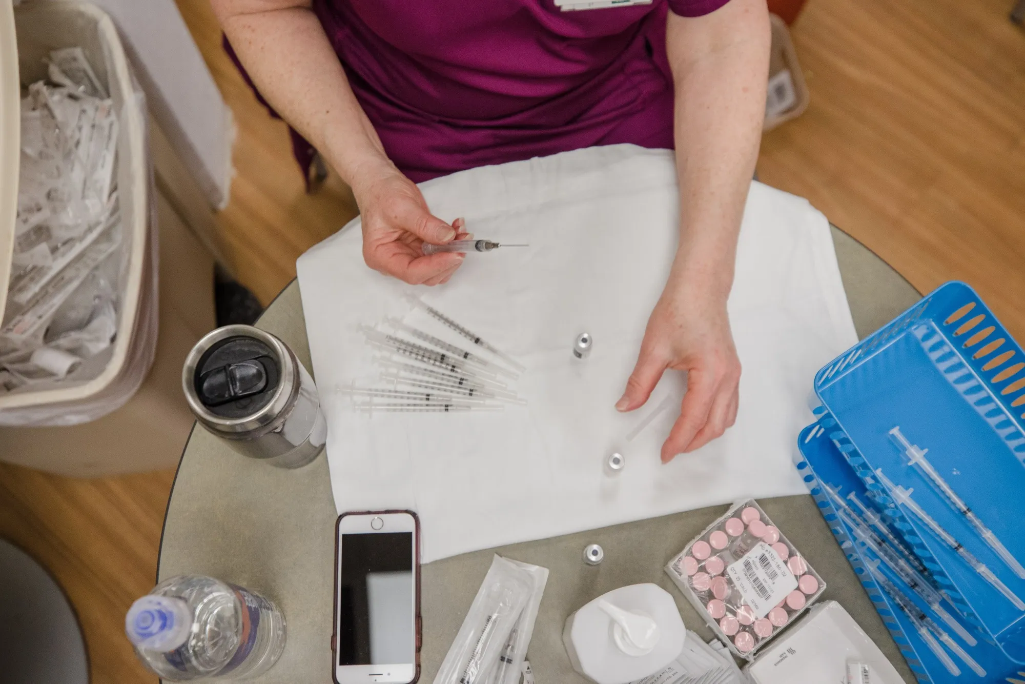 A nurse draws doses of the Pfizer-BioNTech vaccine at a hospital in Manning, South Carolina.