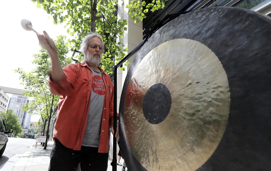 As Seattle's city council voted on whether to repeal the tax, Scott McClay banged a gong 6,000 times, for every Seattle resident living without shelter.