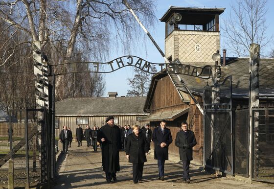 Merkel in Auschwitz Offers a Stern Warning to a Divided World