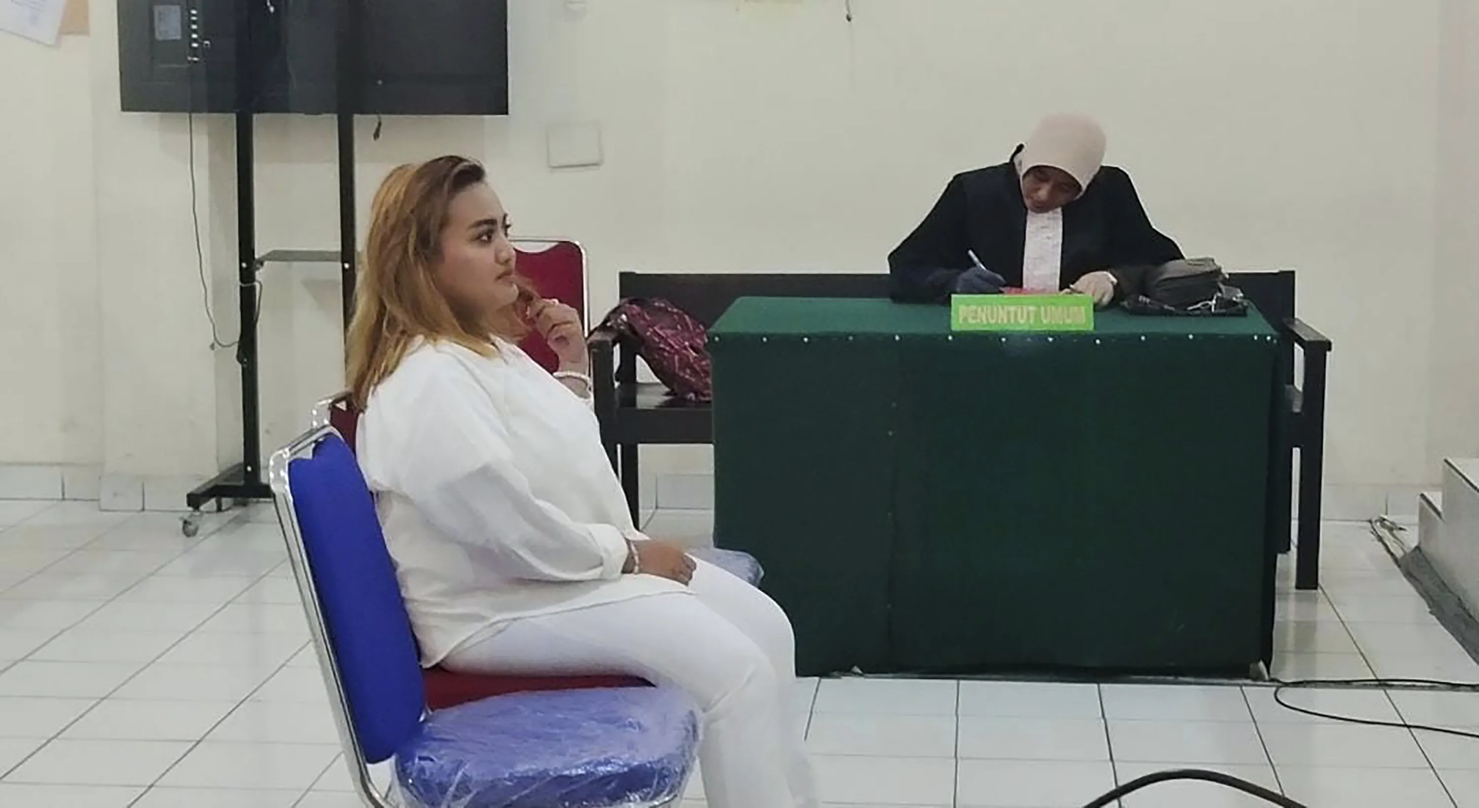 Lina Lutfiawati, who is also known as Lina Mukherjee, at court in Palembang, South Sumatra, Indonesia, on&nbsp;Sept 19.