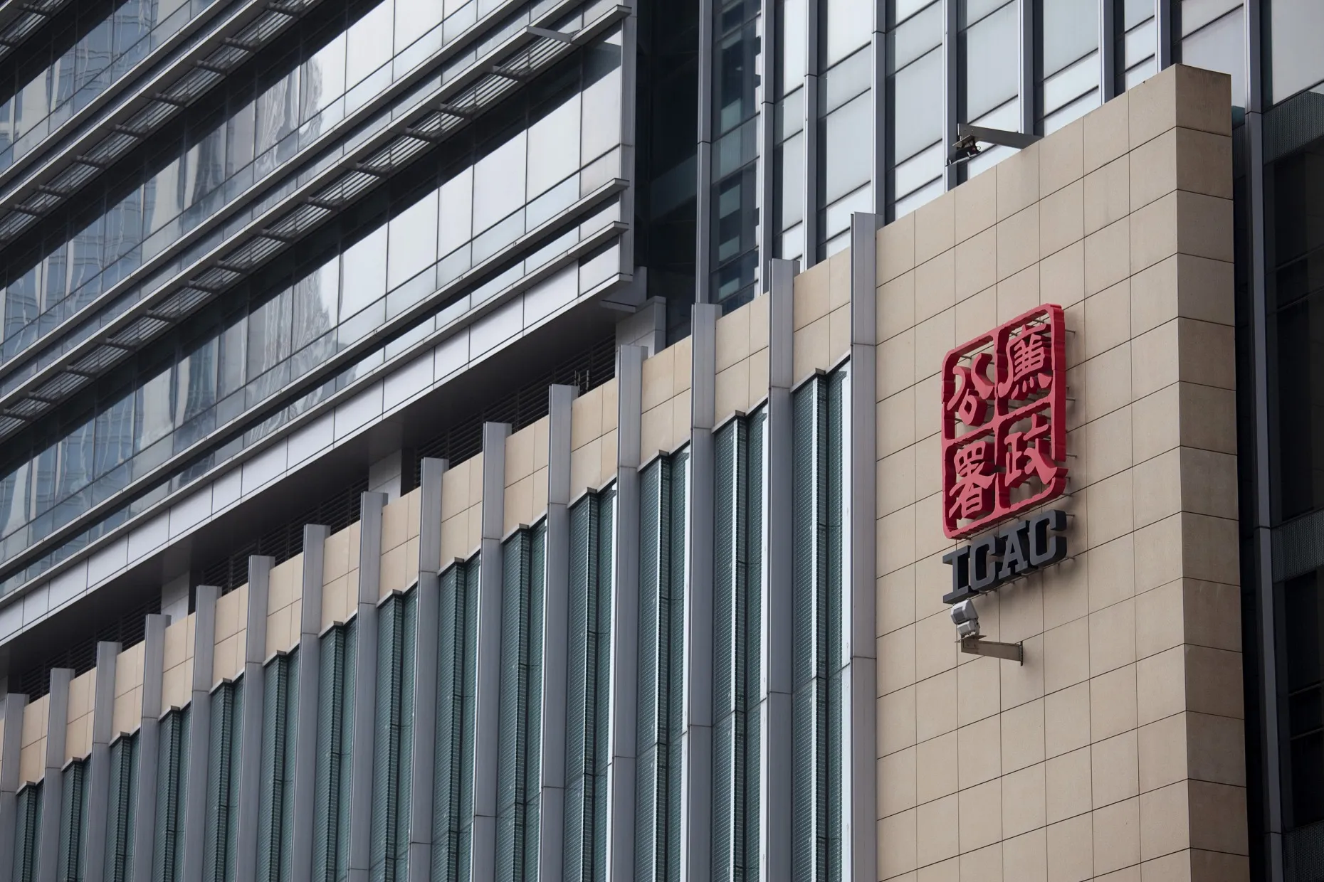 The logo of the Hong Kong Independent Commission Against Corruption (ICAC) is displayed outside the the commission's headquarters in Hong Kong, China, on Tuesday, April 10, 2012. The Independent Commission Against Corruption on March 29 detained and later released Thomas and Raymond Kwok, co-chairmen of Sun Hung Kai Properties Ltd., on suspected bribery charges.