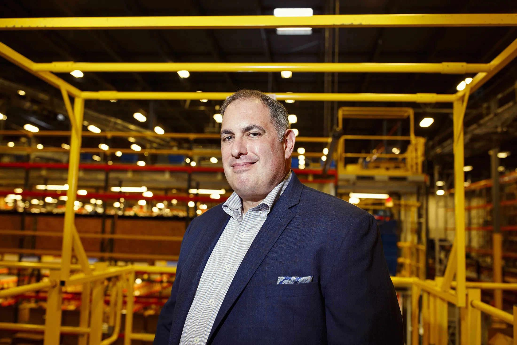 Hire Dynamics CEO Larry Feinstein at a&nbsp;fulfillment center in Braselton, Ga.