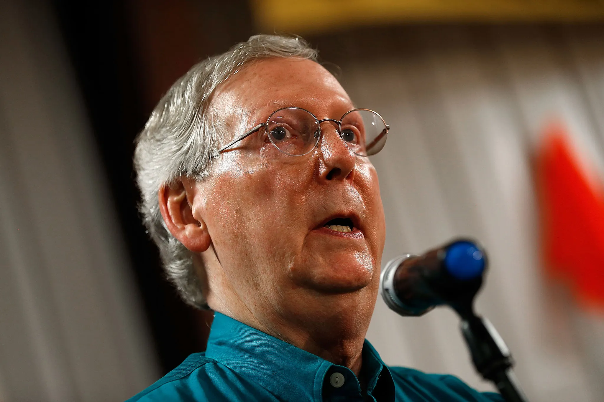 Senate Minority Leader Mitch McConnell (R-KY) speaks to supporters while campaigning at a Rental Pro store during a two day bus tour of eastern Kentucky August 7, 2014 in Hazard, Kentucky. McConnell is locked in a tight race against Democratic challenger Kentucky Secretary of State Alison Lundergan Grimes.
