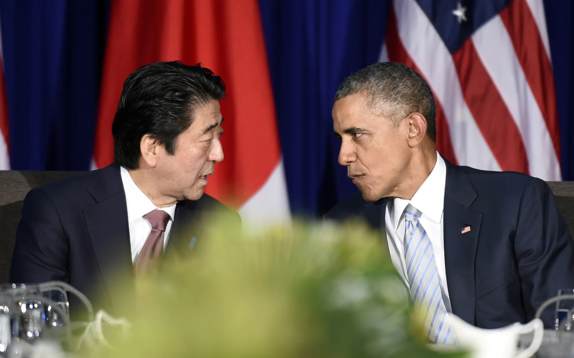 Shinzo Abe and Barack Obama talk during a bilateral meeting at the APEC Summit in Manila.
