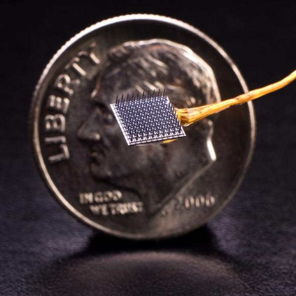 This 4-mm square array is implanted in the brains of people participating in BrainGate.org research. It detects neural signals that are then translated into a computer commands.
