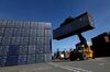 A reach stacker lifts a China Railway Container Transport Corp. Ltd. shipping container at Duisport shipping port in Duisburg, Germany, on Tuesday, Sept. 11, 2018. The trade route known in Beijing as the Belt and Road Initiative is spurring $1 trillion of investment on rail, highways and ports linking Europe and Asia.