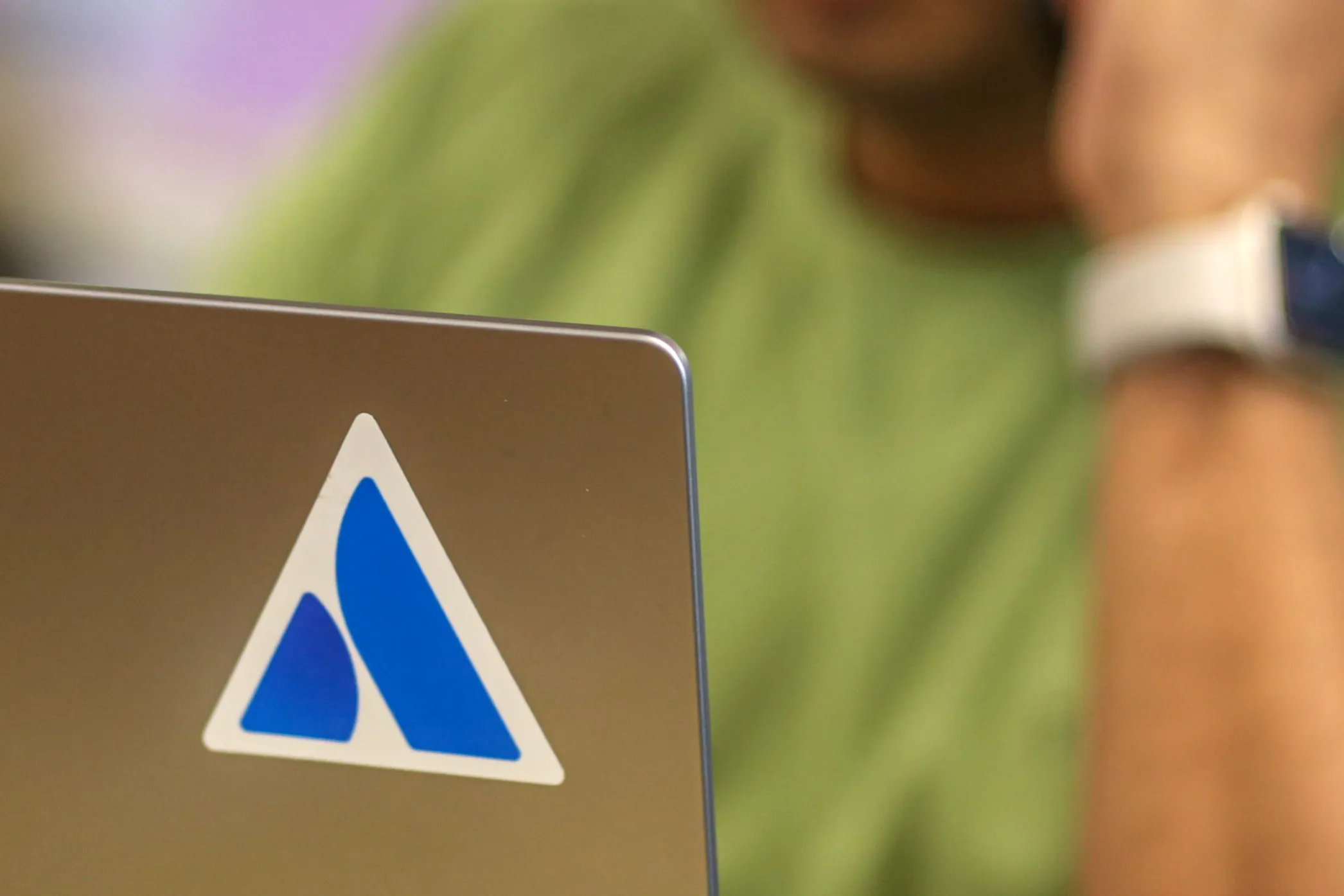 The Atlassian logo on worker's laptop at the company's offices in Bengaluru, India.