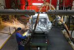 A worker&nbsp;welds body panels on the shell of a Ford Focus automobile at a Ford Sollers plant in Saint Petersburg, Russia.