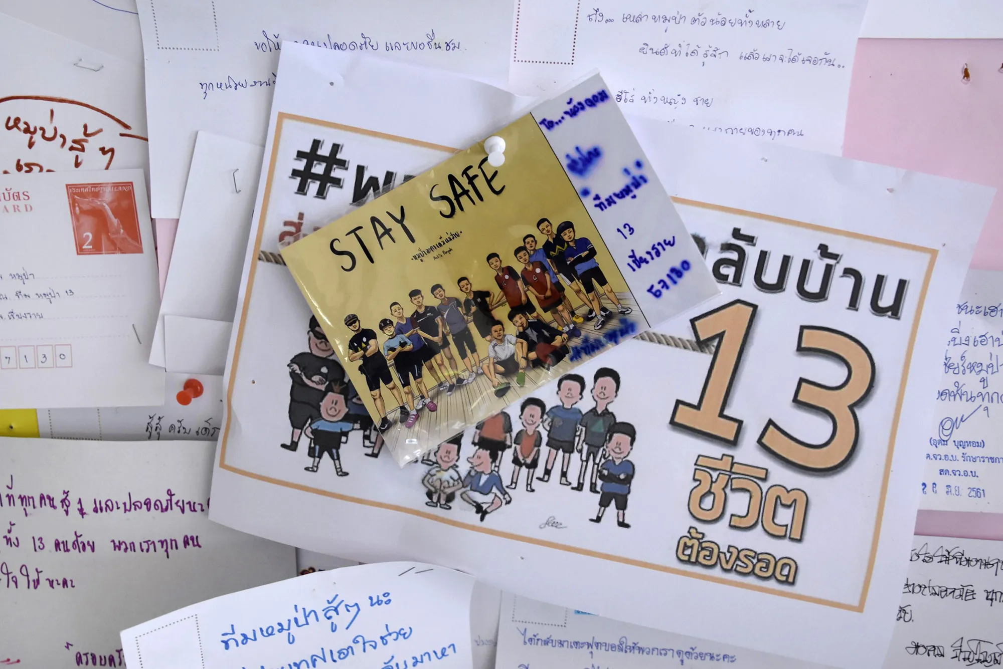 Message cards for the boys and their soccer coach displayed near the Tham Luang Nang Non cave in Thailand's northern province of Chiang Rai&nbsp;on July 10, 2018.&nbsp;