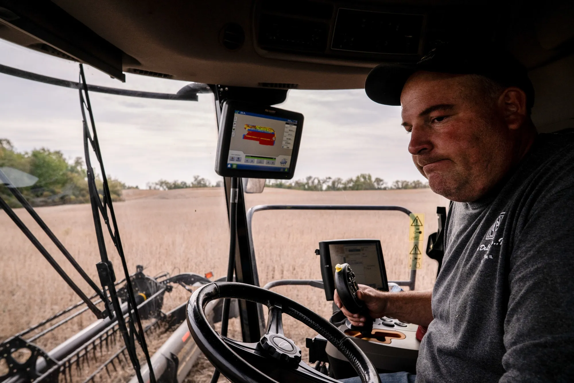 Farmer John Bartman&nbsp;harvests soybeans near&nbsp;Harvard, Illinois.