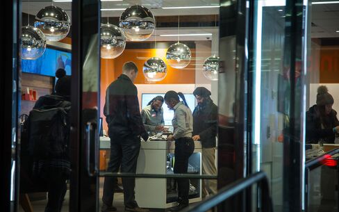 Operations Inside An AT&T Inc. Store Ahead of Earnings Figures
