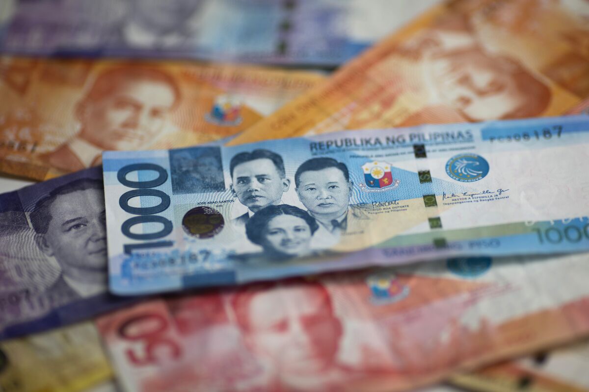 Philippine Peso Declines Past Key 57-Per-Dollar Level