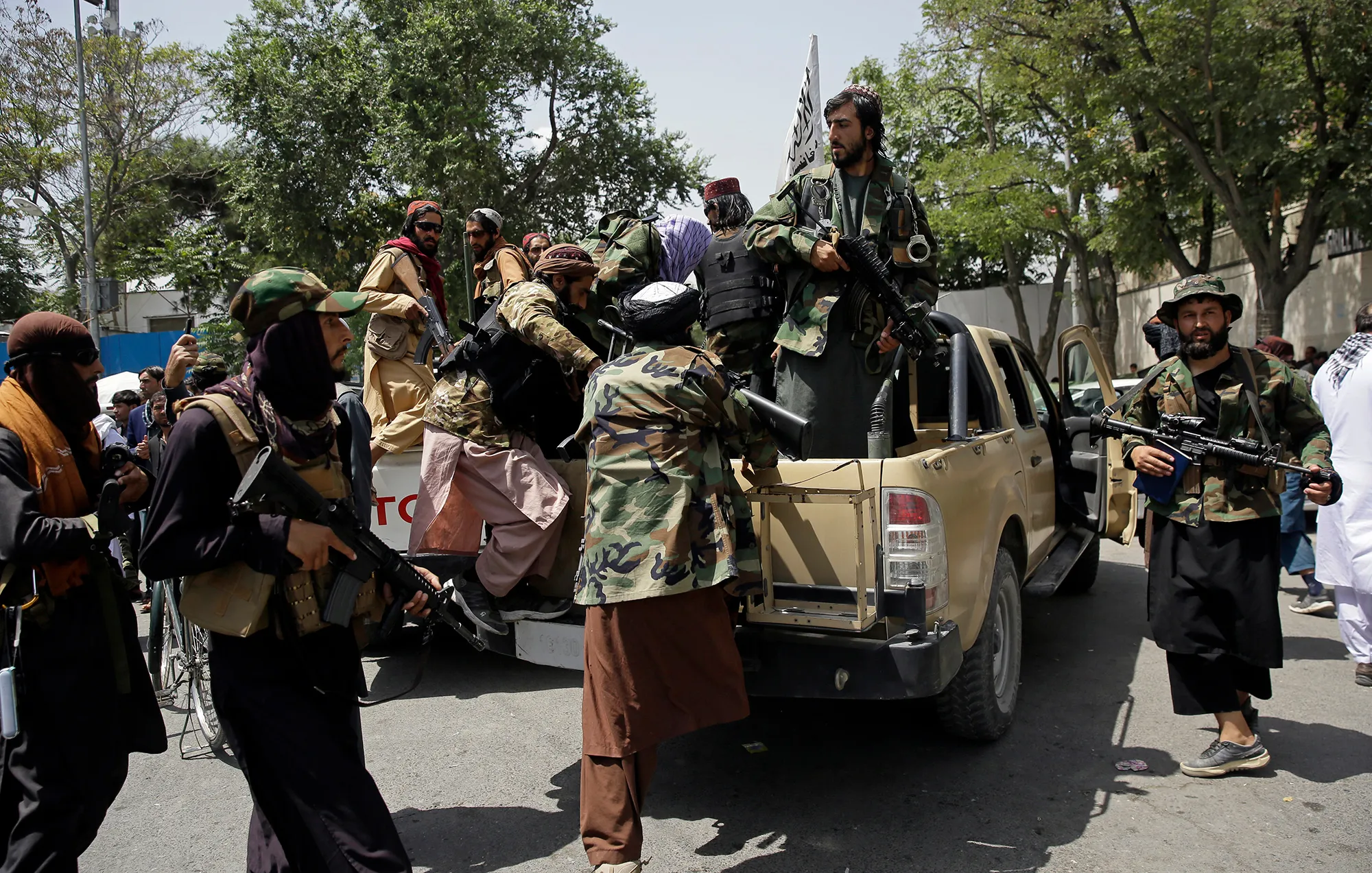 Taliban fighters patrol in Kabul, on Aug. 19.