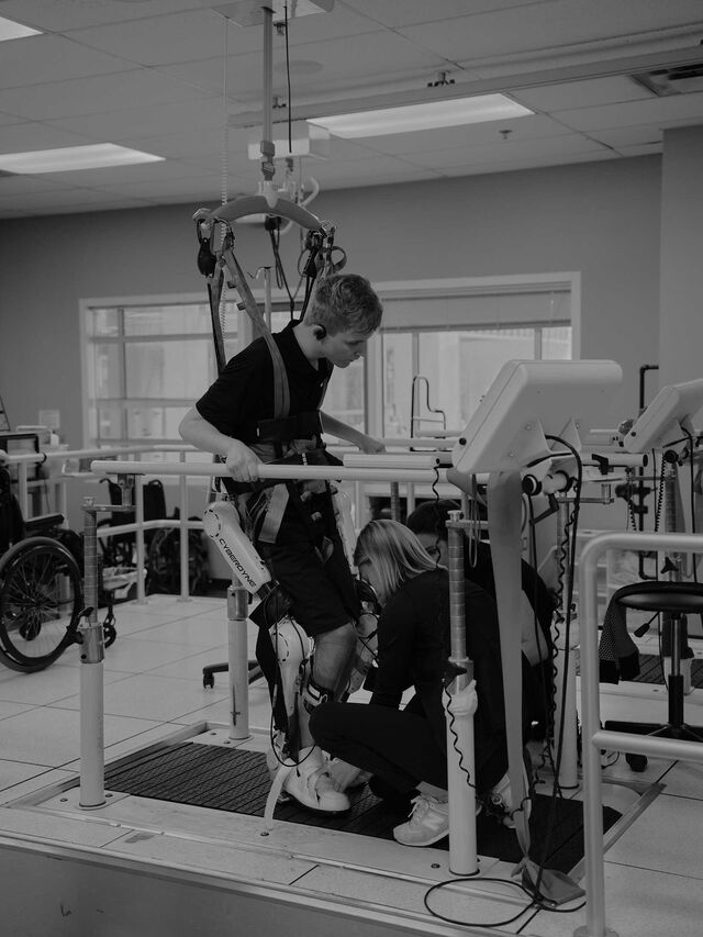 Michael Brewer using a walking aid at a rehabilitation facility in Jacksonville. 