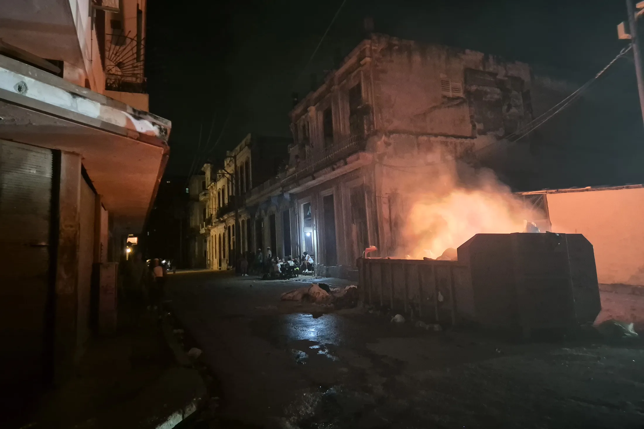 A dumpster on fire during a nationwide power outage in Havana on Oct. 20.