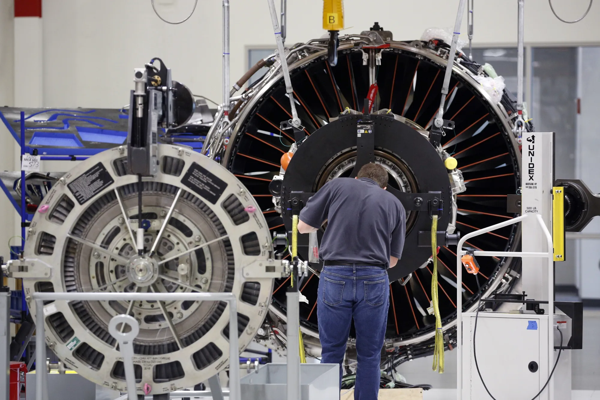 An employee assembles a LEAP jet engine at the General Electric Co. (GE) Aviation assembly plant in Lafayette, Indiana.