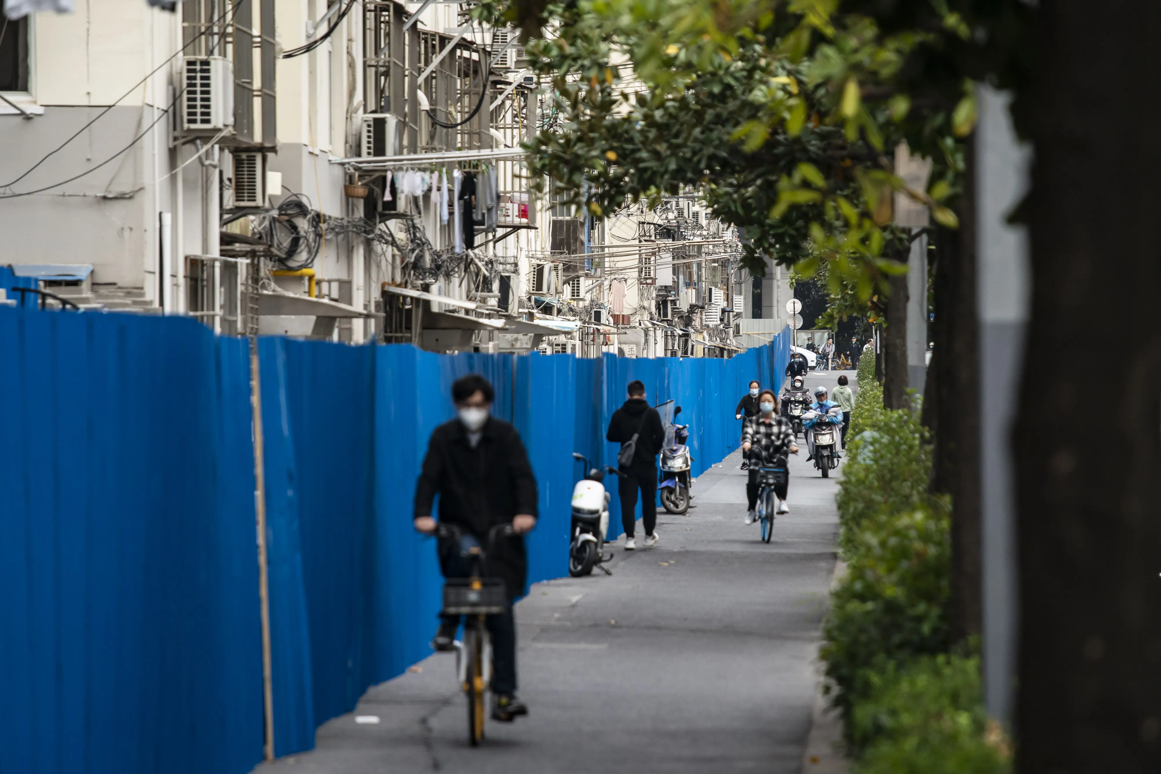 Fences surround a neighborhood placed under lockdown due to Covid-19 in Shanghai on&nbsp;Oct. 26.