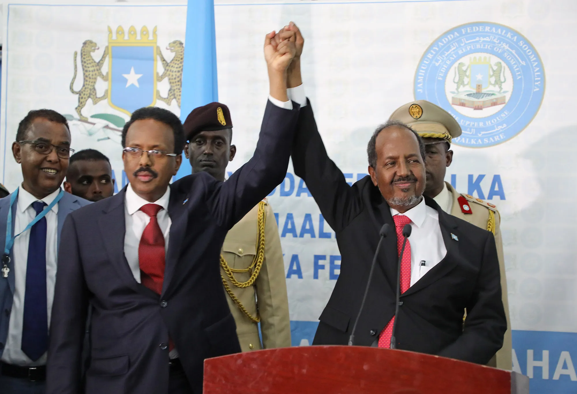 Hassan Sheikh Mohamud, right, after his swearing in, in Mogadishu, on May 16.